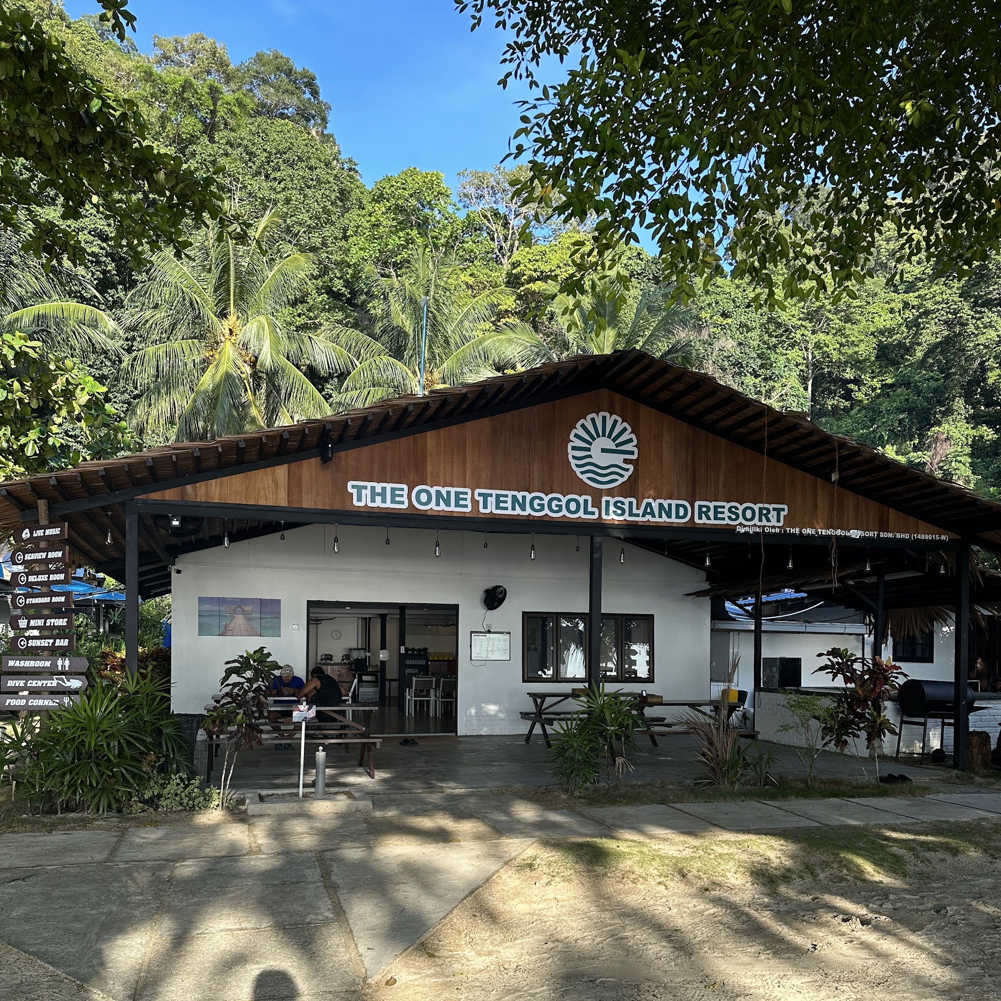 The One Tenggol Island Resort main building and dining area framed by jungle